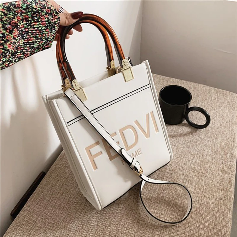 

Для женщин 2021 модная Изысканная сумка для покупок Ретро повседневные женские тоуты сумки на плечо женская кожаная однотонная сумка на цепо...