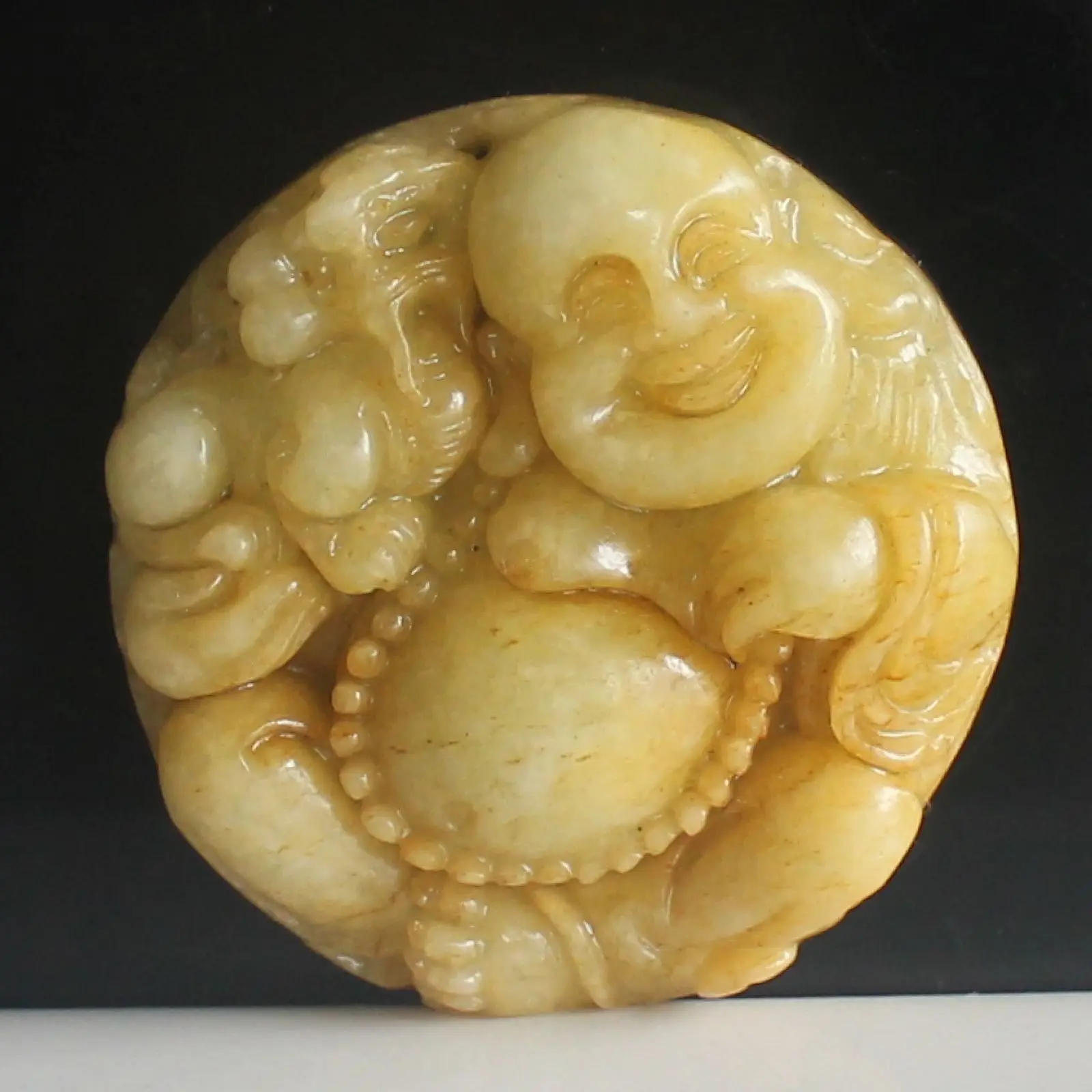 

Chinese old jade laugh buddha pendant