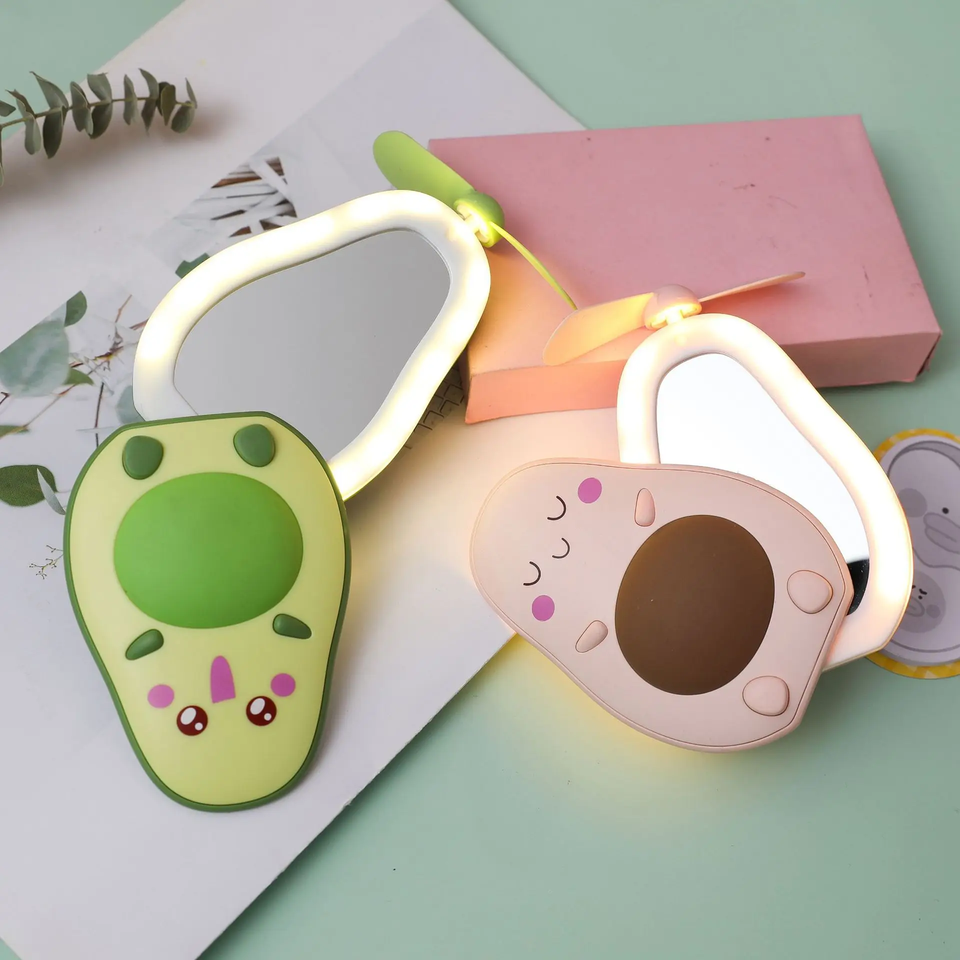 

Mini Multifunctional LED Makeup Mirror and Fan 2 in 1 Integrated Cute Avocado Shaped Practical Portable USBCharging Handheld Fan