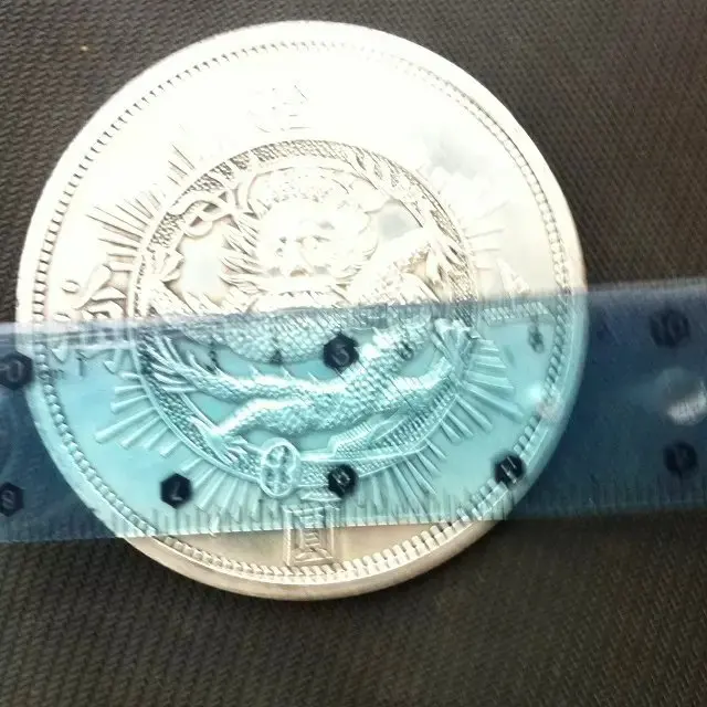 Китайская монета в виде старых серебряных долларов Республика Шанхай 10 юаней