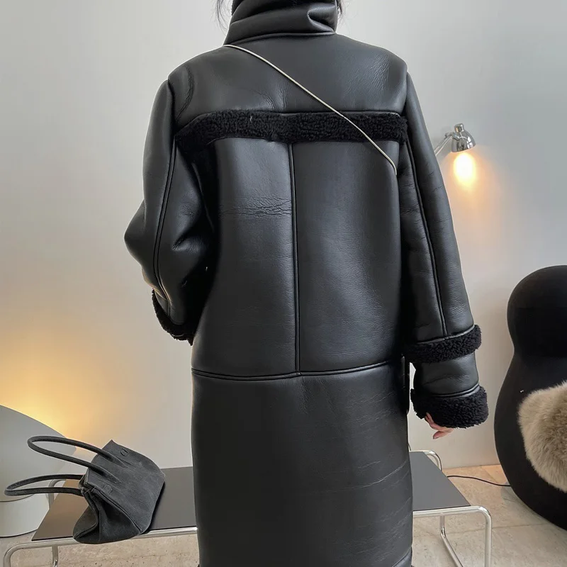 

Winter women's casual solid color pocket decoration loose long imitation leather motorcycle coat