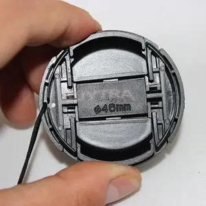 

New 46mm Center Pinch Snap on Front Cap Cover For Camera Lens Filter