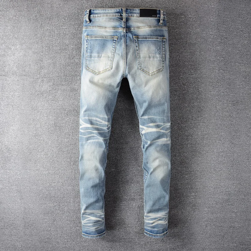 

ABOORUN Hi Street Men's Fashion Rhinestone Pleated Jeans Blue Skinny Ripped Patchwork Jeans for Male
