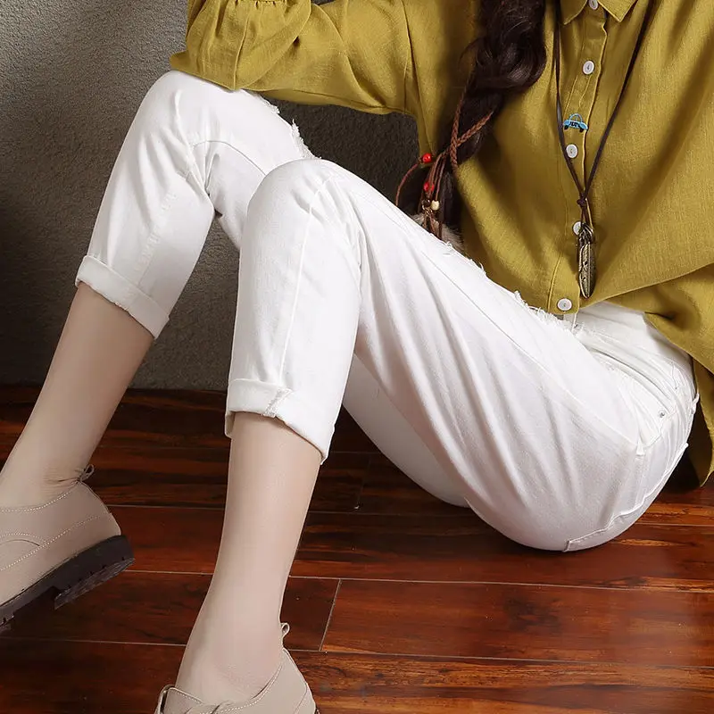 

Black ripped jeans female autumn nine-point pants student loose beggar high waist thin Harlan pants