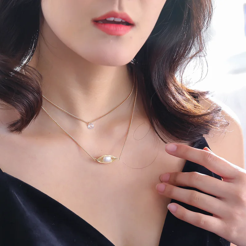 Двухслойная оболочка и жемчужное ожерелье с подвеской из натурального золота