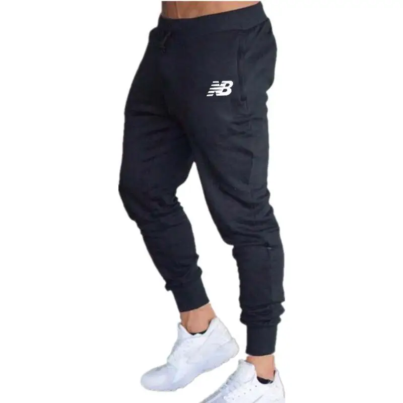 

New casual sports men's quick-drying pants casual pants fitness running sports pants men's slim feet pants