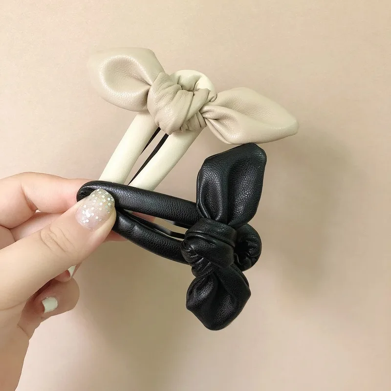 

Korean net red bangs hairpin new PU patent leather three-dimensional bow tie hairpin women's simple hair accessories women