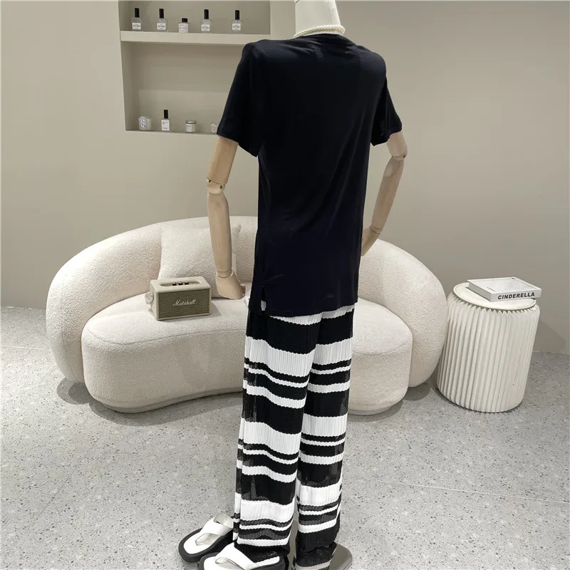 

New Women's Clothing Summer 2021 Irregular design T-shirt + loose and thin color matching wide legs Pants Two piece set