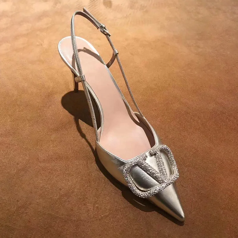 

Silver high heeled shoes women's summer slim heel 2021 new one line buckle fairy diamond pointed Baotou sandal women's middle
