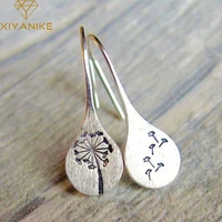xiyanike silver color 2021 new dandelion drop earrings for women retro simplicity handmade jewelry wholesale gift c%d0%b5%d1%80%d1%8c%d0%b3%d0%b8