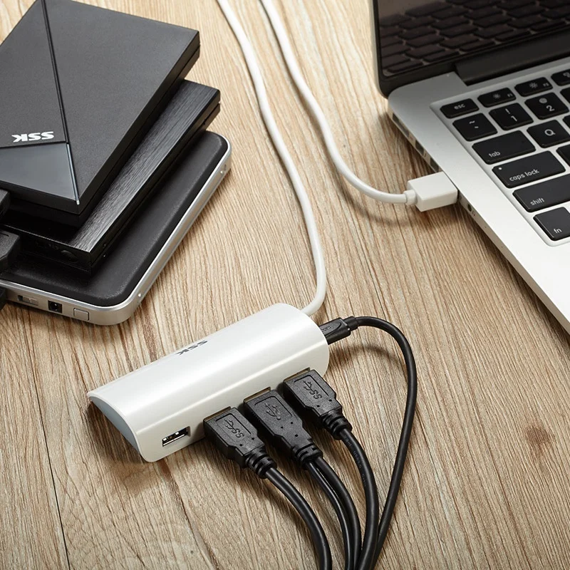 

SSK One USB 2000 HUB : Windows 98/ME/XP/Vsta/8 Mac OS10.9