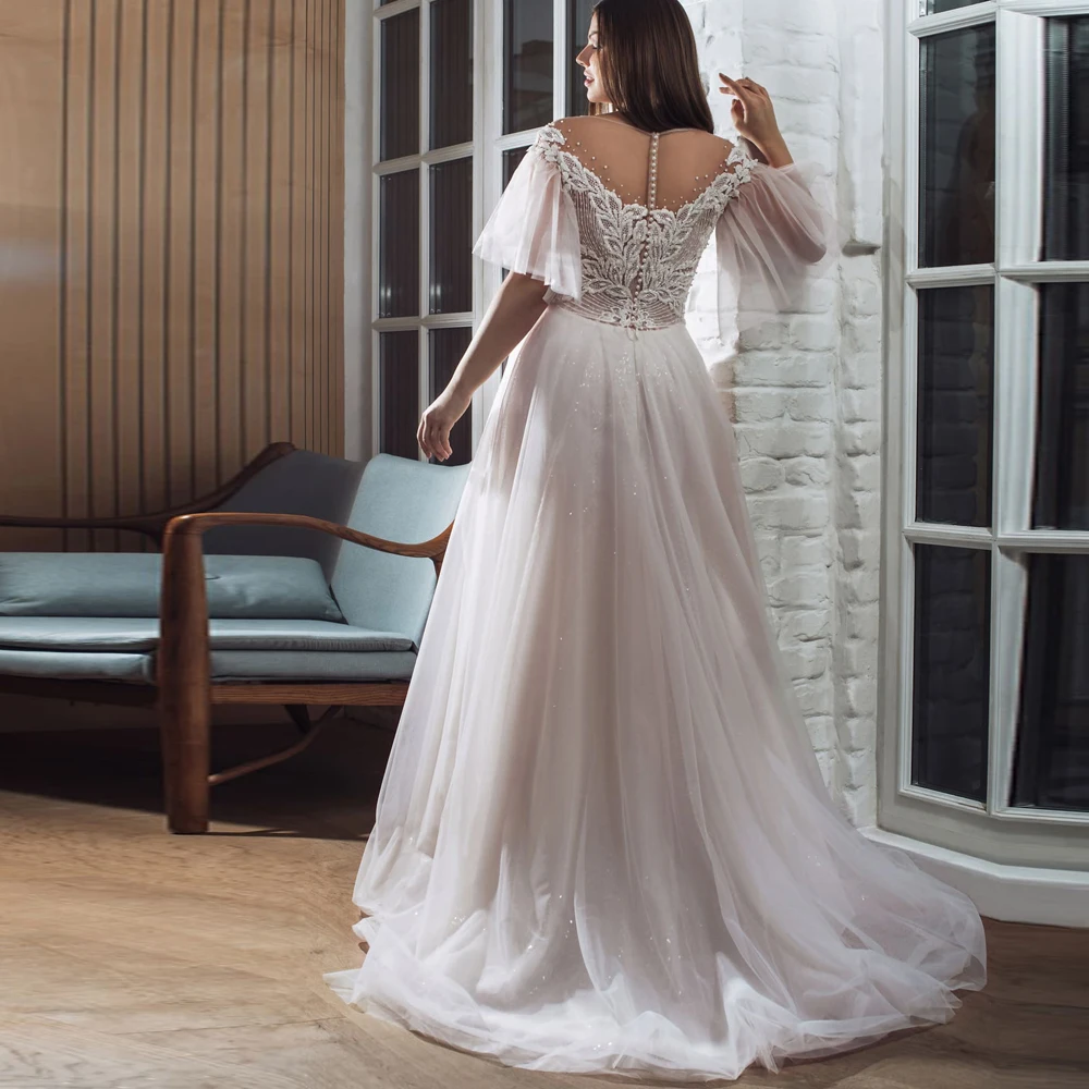 

Vestidos Elegant Wedding Dresses Tulle Illusion Appliques Pearls Bateau Half Sleeve Covered Button Ball Bridal Gowns