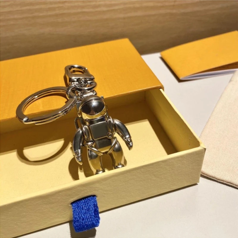 

Luxury Metal Astronaut Keychain Popular Brand High Quality Car Key Chain Ring Letter Spaceman Bag Charms Keychains Accessories