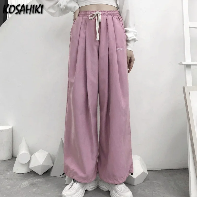 

Брюки спортивные женские оверсайз с широкими штанинами и завышенной талией