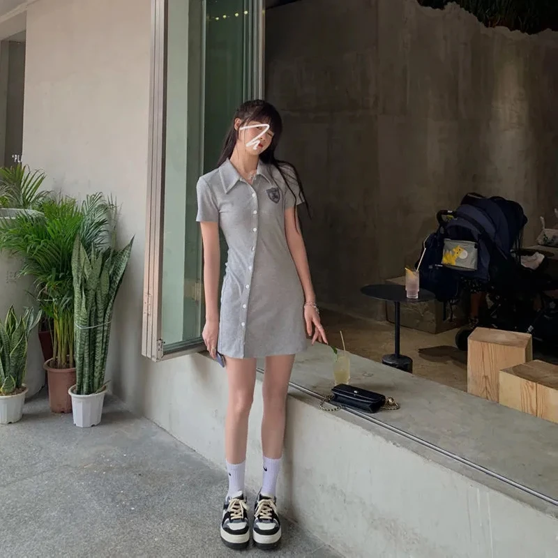 

Women's summer dress 2021 casual bag hip slim fit ins temperament short skirt prom dress oblique button short-sleeved dress