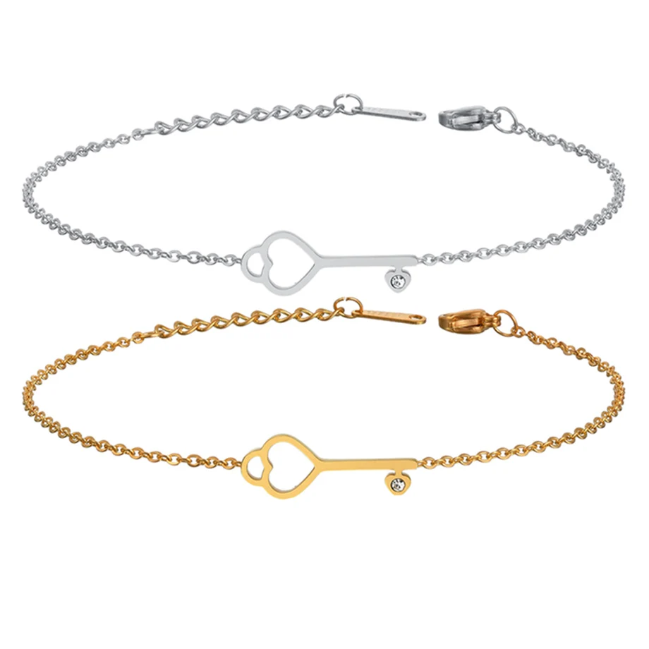 Женский браслет из нержавеющей стали золотистый с подвеской в виде сердца и