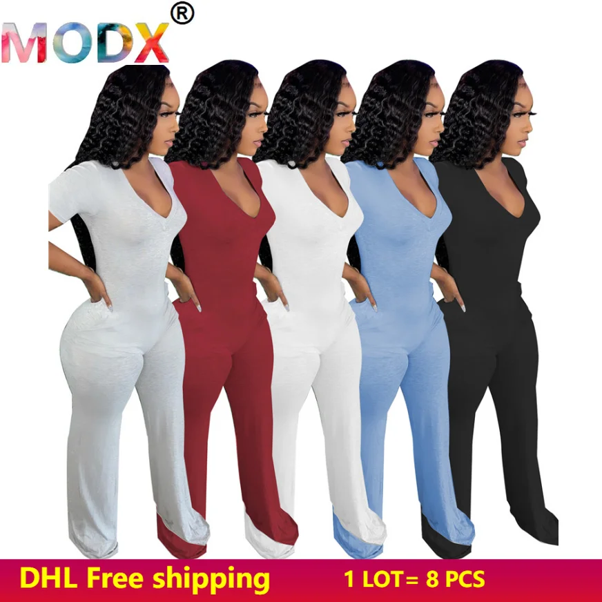 

Женский однотонный комбинезон с широкими штанинами и коротким рукавом