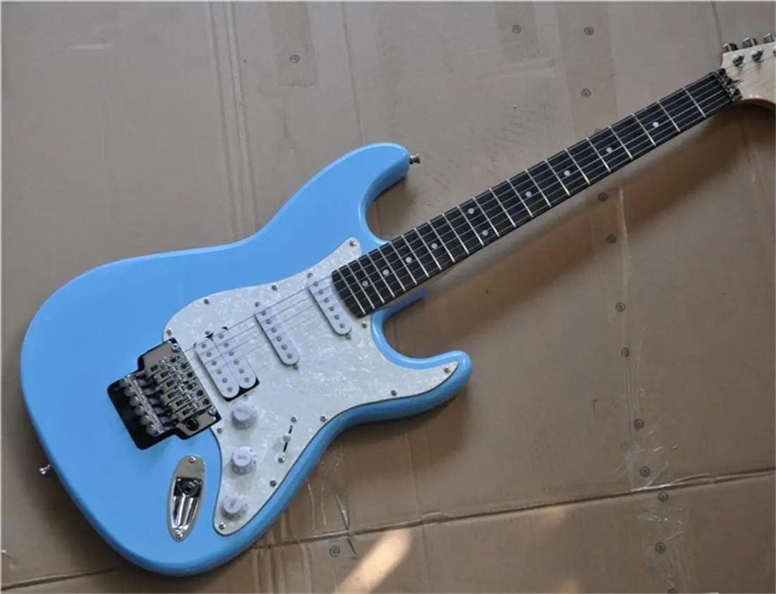 Classic fender 6 string electric guitar, light blue body, do
