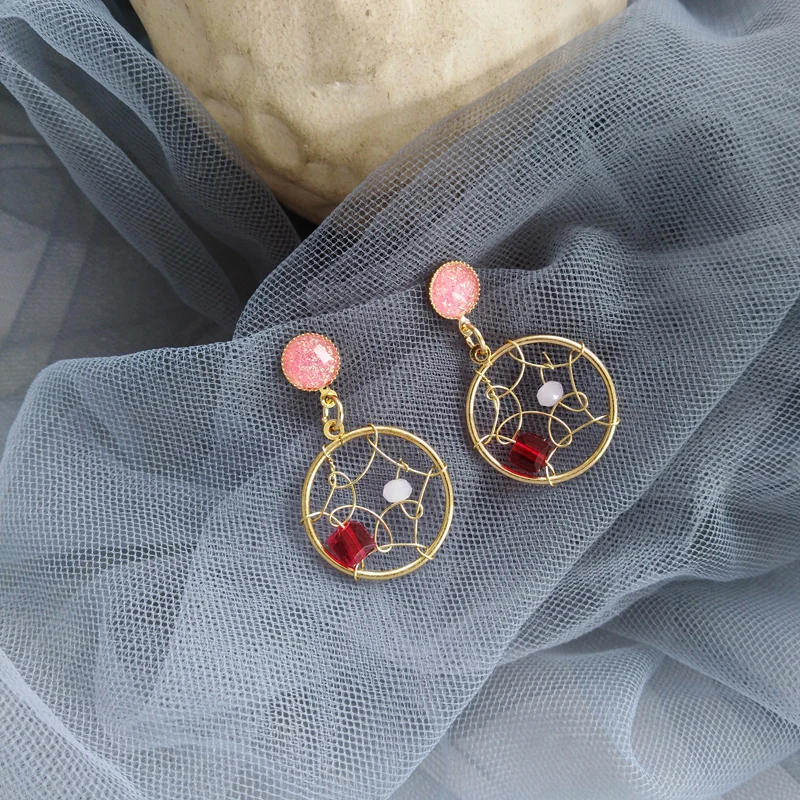 

Japan and South Korea simple ideas to catch the dream earrings super fairy maiden pink woven mesh earring niche earrings tide