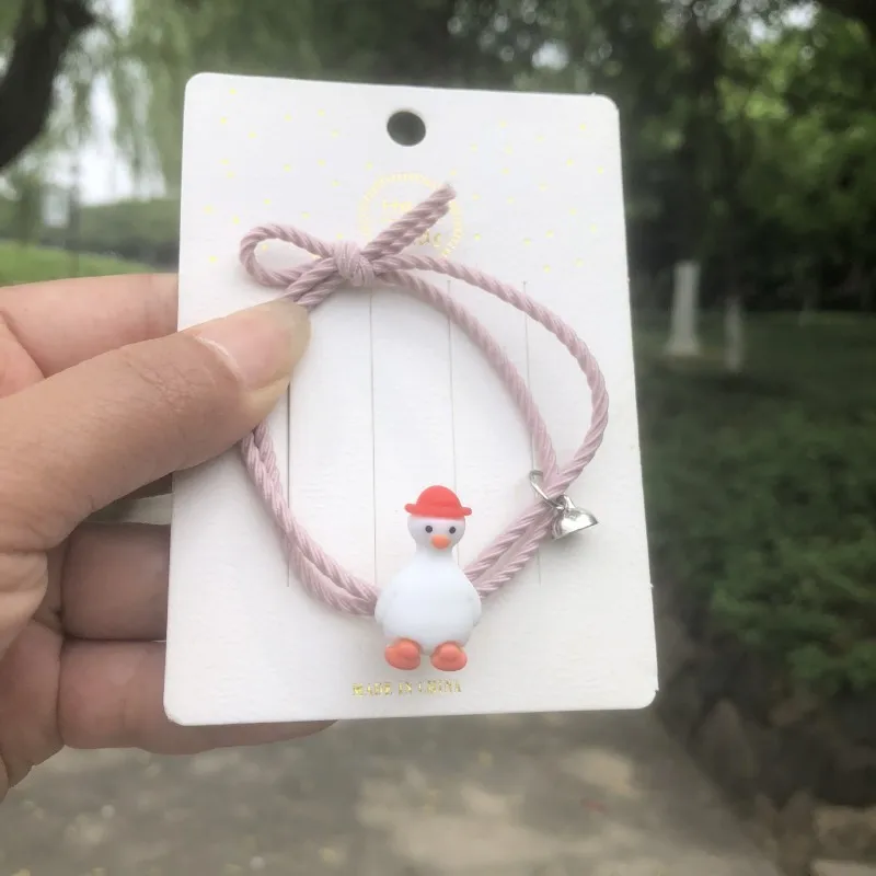

Cute Cartoon Duck Couple Bracelet Magnet Ball Hand Men and Women Gift Friendship Charms Elastic Rope Jewelry