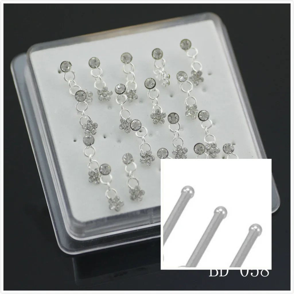 Женское кольцо в носу классическое ювелирное изделие с серебряными гвоздиками