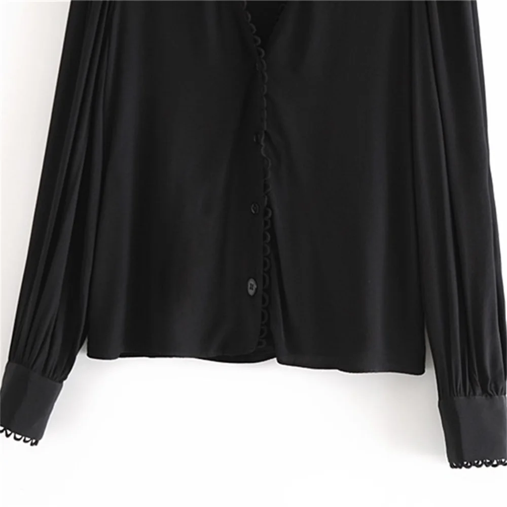 

2020 autumn women's new stitching drape blouse V-neck buttoned bubble long-sleeved loose oversized shirt