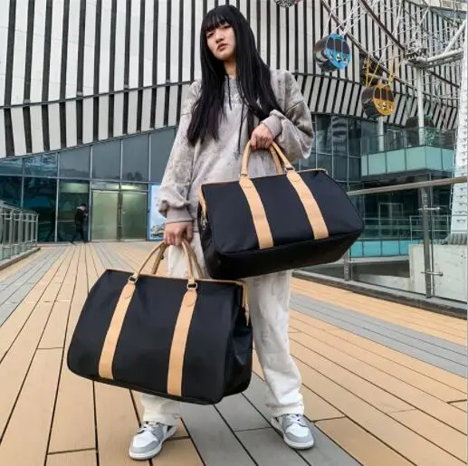 Travel 11bag women's fashion outing handbag men's luggage bag large capacity can be put on the trolley case travel bag