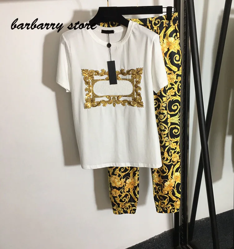 

2021 high quality retro printed embroidery women's suit versatile loose Short Sleeve Top + high waist casual pants two piece set