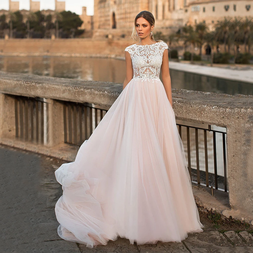 

Elegant Robe De Mariée A Line Tulle Wedding Dress Sleeveless O Neck Sweep Train Romantic Bridal Gowns Floor Length
