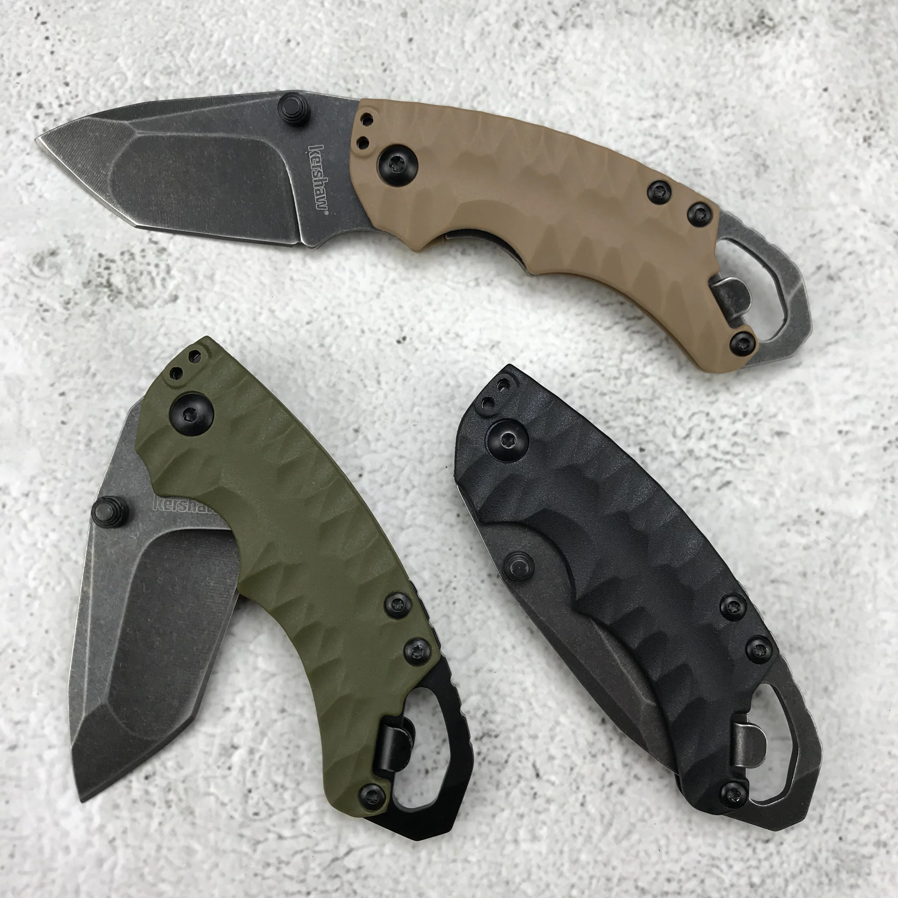 

Kershaw 8750 Shuffle II Multi- Function Folding Knife 2.25\ Blackwash Plain Blade, green GFN Handles black handles tan handles