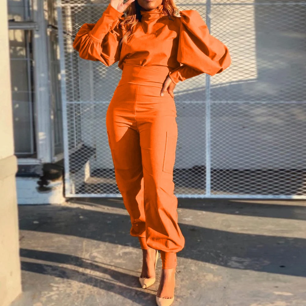 

Женский комплект из двух предметов, повседневный шикарный облегающий однотонный топ с пышными рукавами и карманами, комбинезон в западном ...