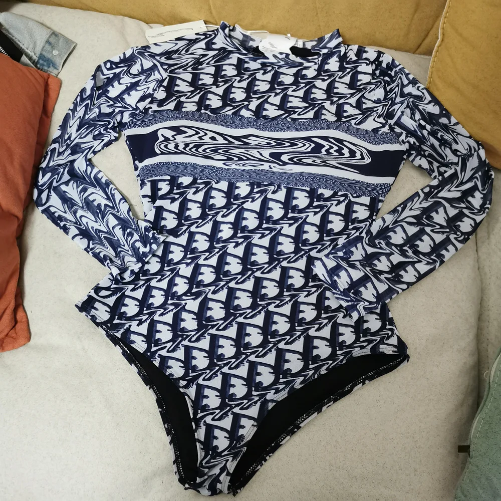 

2021 New European and American Long-sleeved Triangle One-piece Swimsuit Female D Letter Mesh Holiday Swimwear Summer Beachwear