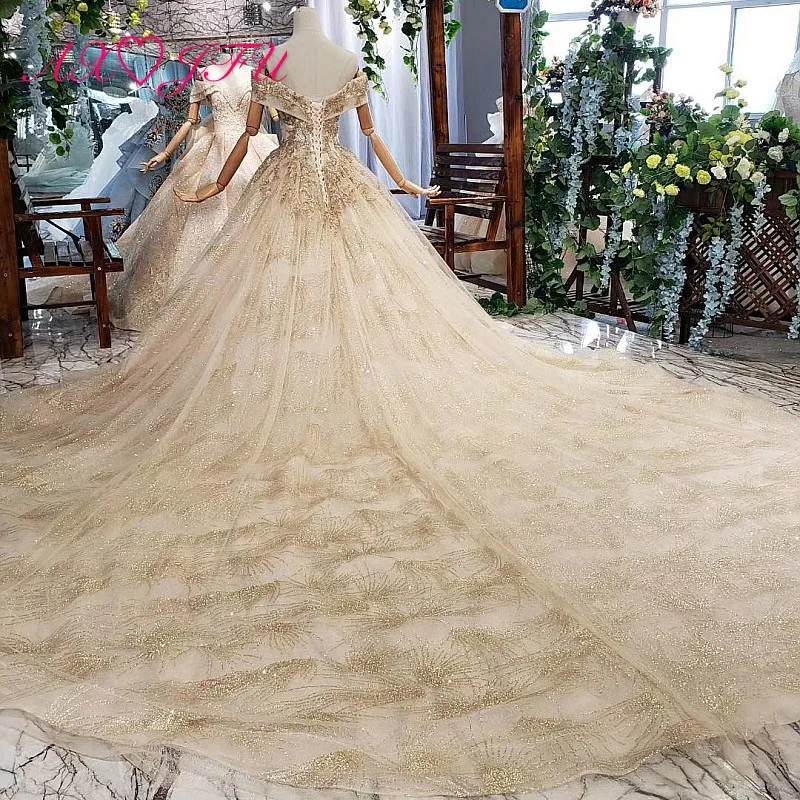 AXJFU Luxury princess golden flower lace boat neck beading crystal sparkly star bride tail wedding dress real photo 11669