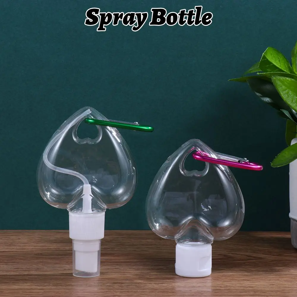 

50ml Portable Perfume Travel Alcohol Leaf Heart Spray Bottle Lotion Jar Empty Container Bottle With Metal Hook