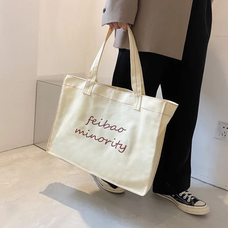 

Fashion large capacity canvas Tote bag 2021 autumn and winter new texture handbag for women