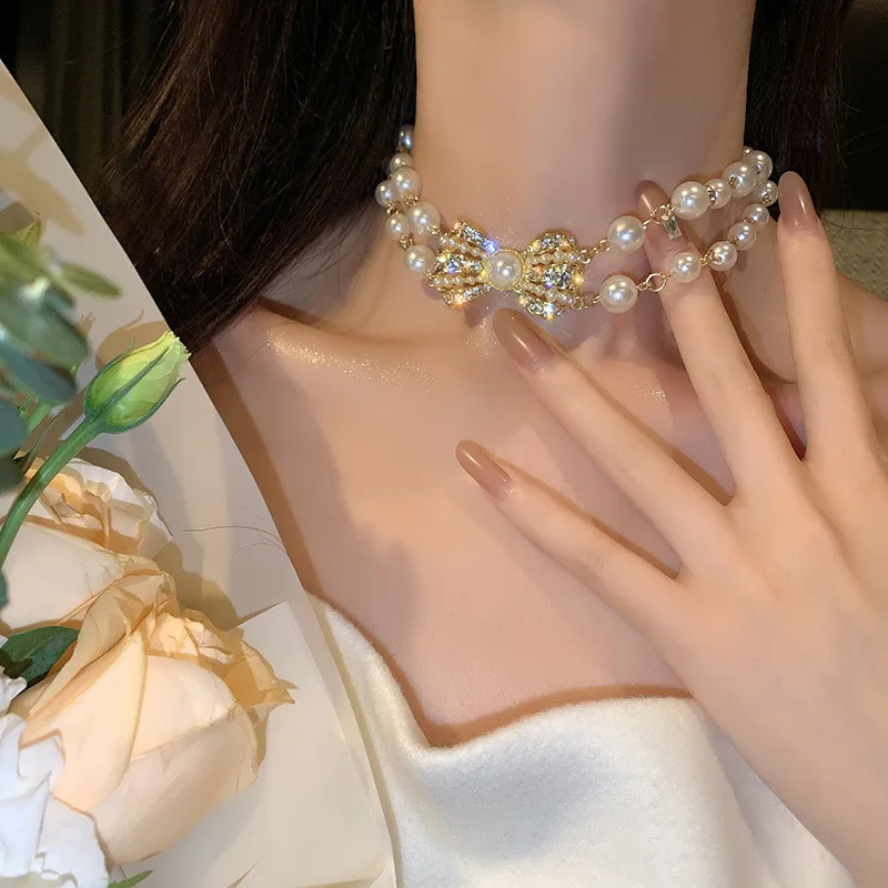 

Women Clavicle Chain Double-layer Pearl Short Snake Bone Necklace Jewelry Fashion Exaggerated Full Zircon Artificial Pearl Bow