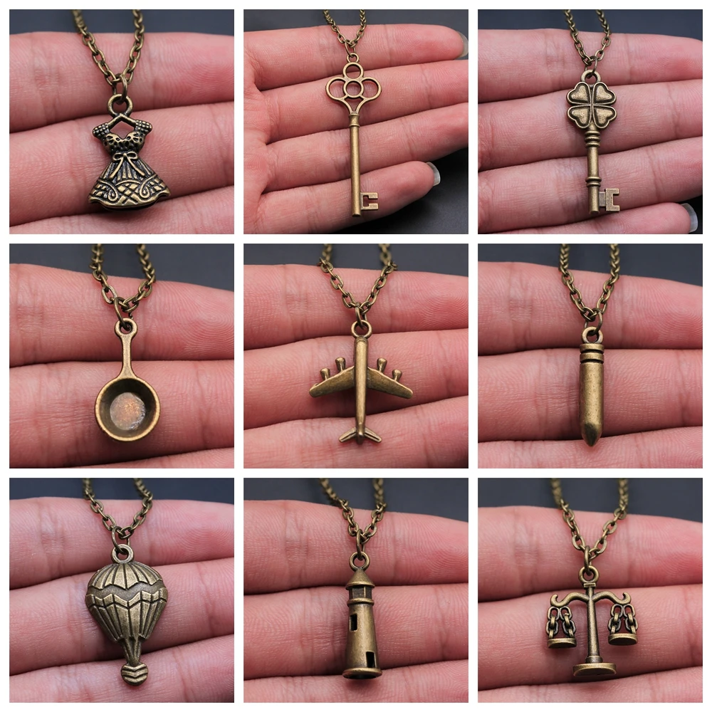 

Vintage Antique Bronze Color Pendant Necklace Airplane Lighthouse Tower Gun Key Pan Shaped Pendant Necklace Gift