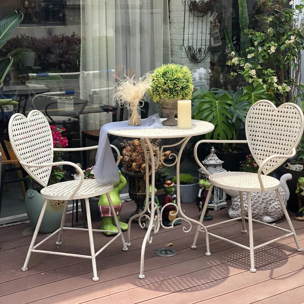 

Outdoor garden table and chair three-piece combination wrought iron old art leisure home balcony heart-shaped chair