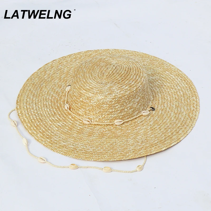 

Женская пляжная шляпа с цепочкой, роскошная дизайнерская шляпа от солнца с ракушками и бусинами, шляпа с широкими полями и защитой от ультра...