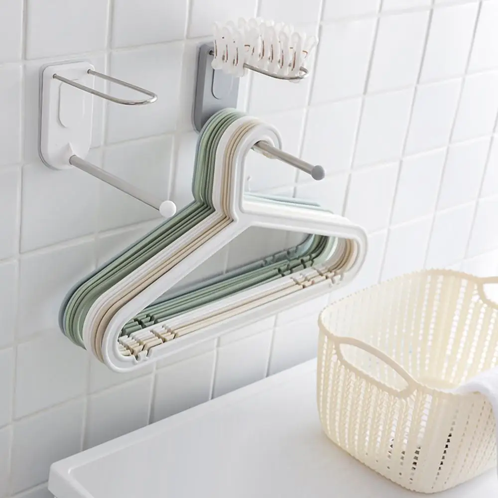 

Hanger storage organizer wall-mounted adhesive saves space and washing machines Multifunctional balcony hanger rack 40JP14