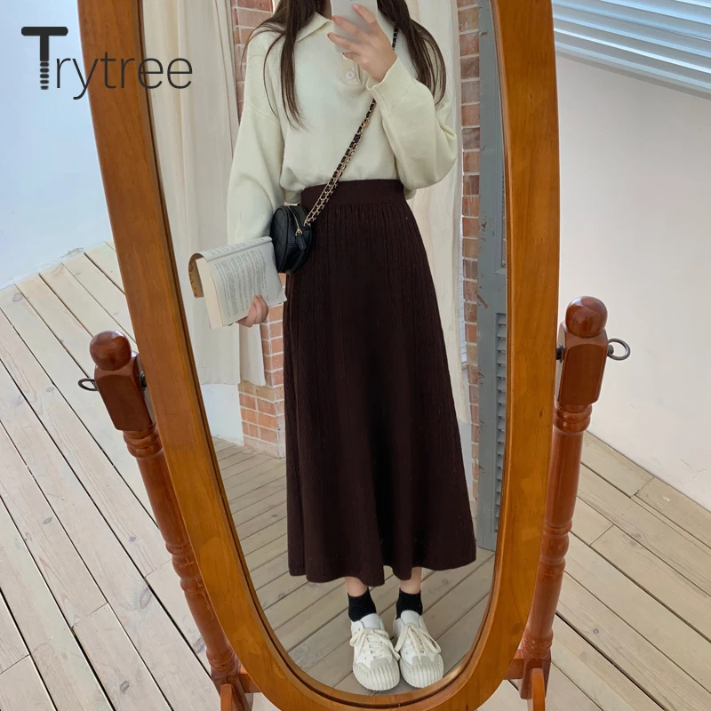 Женская трикотажная юбка в полоску до середины икры | одежда