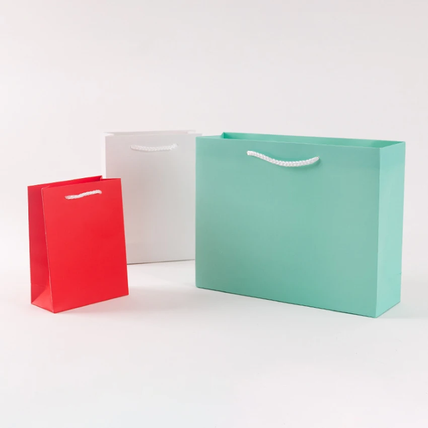 

30pcs/lot Solid Thicken Kraft Paper Gift Bag Paper Bags Birthday Wedding For Gifts With Handle 21*15*8cm Wholesales