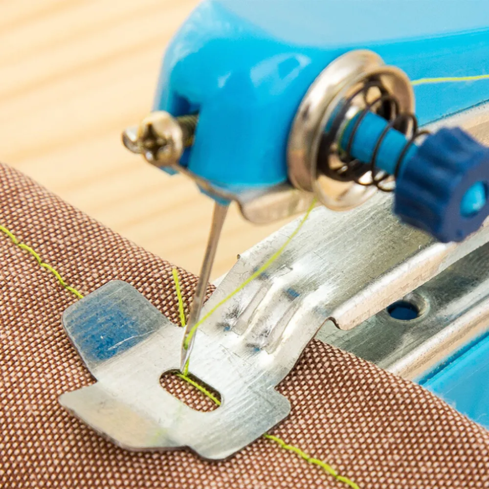

Manual Operation Portable Mini Sewing Machine Creative Simple Sewing Tools Home Travel Small Embroidery Random Color