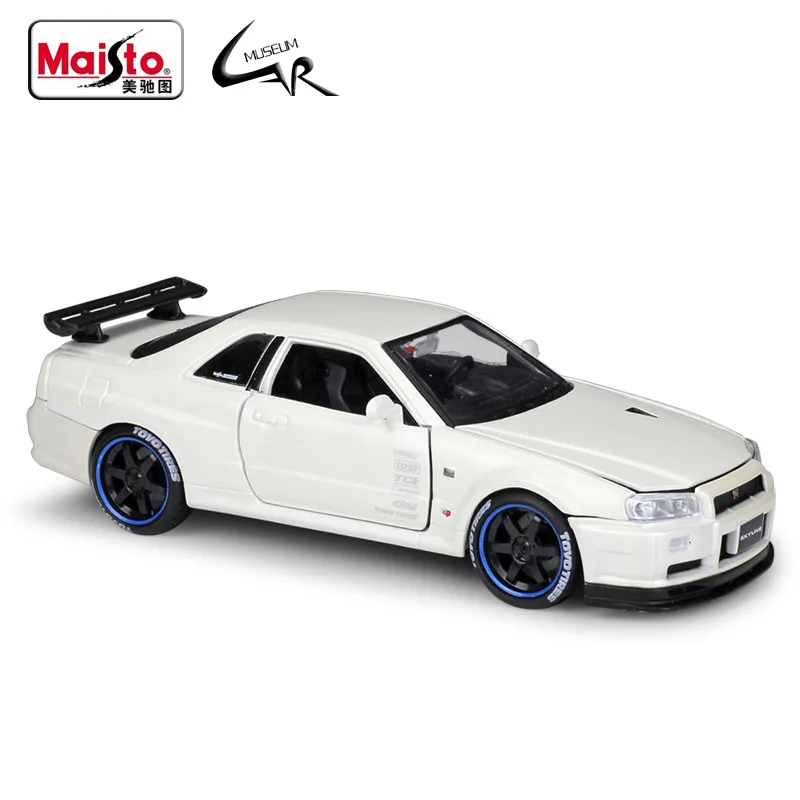 

Модель автомобиля Maisto 1:24 из сплава, детская игрушка в подарок, коллекция Nissan Skyline GT-R R34 модифицированная версия
