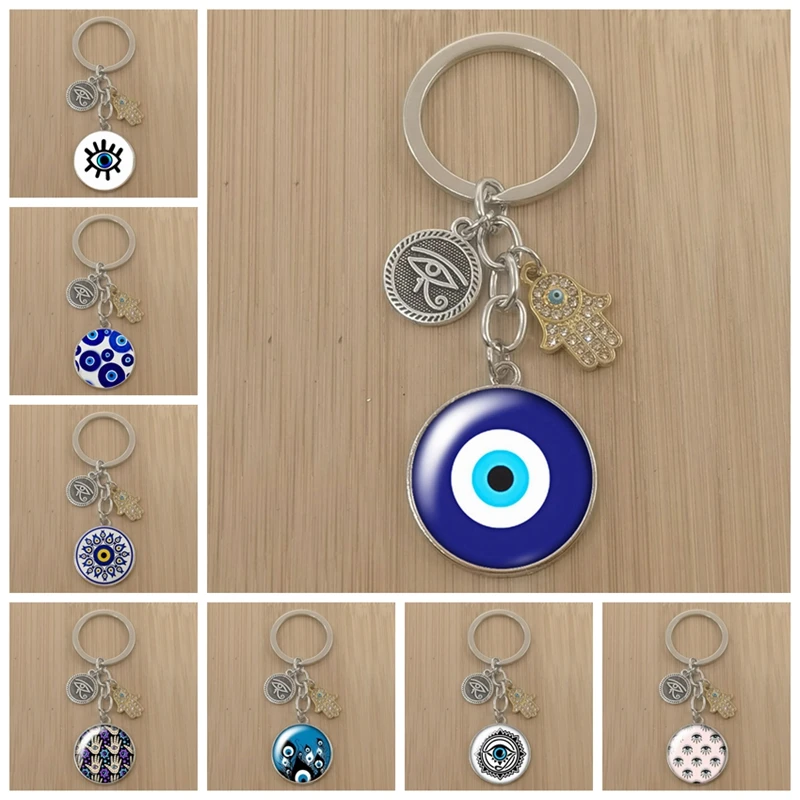 Красивый круглый стеклянный кабошон с изображением синего сглаза для