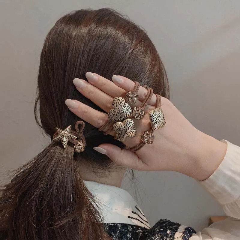 

New four-leaf clover hair rubber band alloy letter hair circle net red hair rope small fresh head rope hair accessories simple