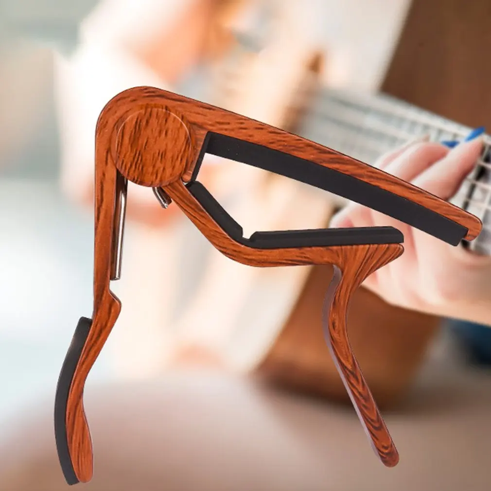 

Wood Grain Metal Guitar Capo with Perfect Silicon Cushion for Guitar Ukulele Tuning Musical Instrument Accessories Guitar Clip