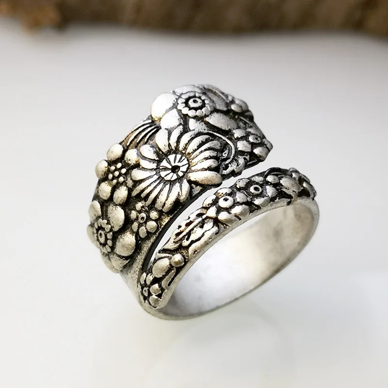 

Korean retro simple creative flower vine ring fashion jewelry net red plating 925 Thai silver adjustable ring suitable for women