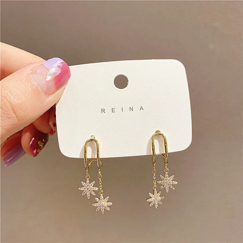

Eight-pointed star metal tassel earrings Korean version of the same earrings diamond temperament net red nails