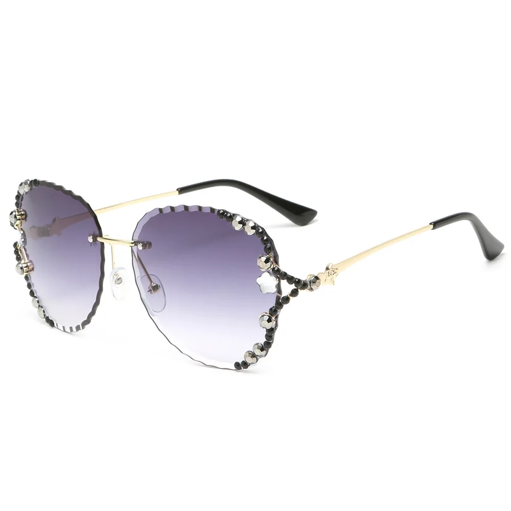 

Fashion Luxury Rhinestone Diamond Sunglasses For Women Classic Retro Beach Travel Rimless Metal UV400 Sun Glasses Eyeglasses New